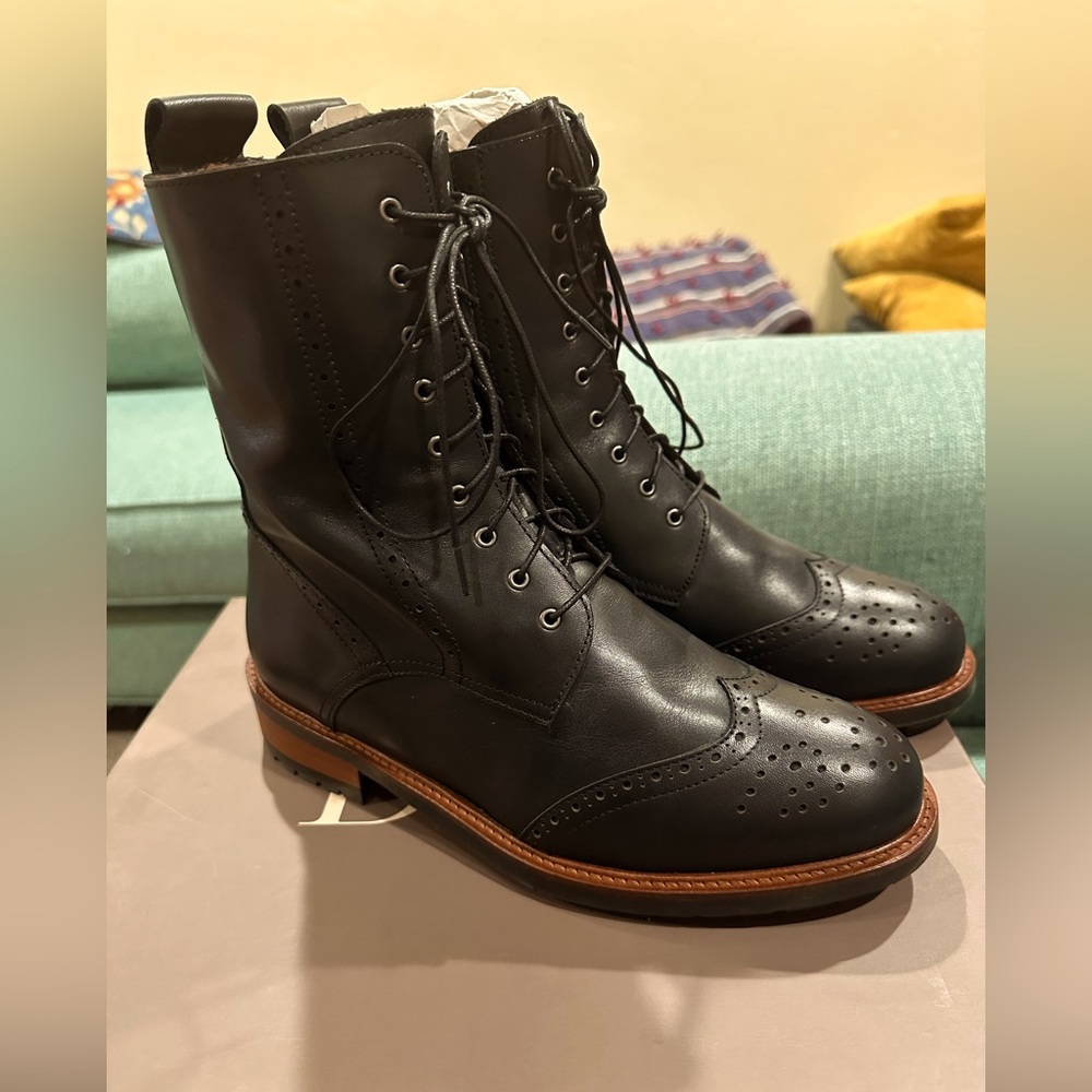 Duo wingtip boots. Black leather. Women’s size 9W. Inside zip. Brand new!
